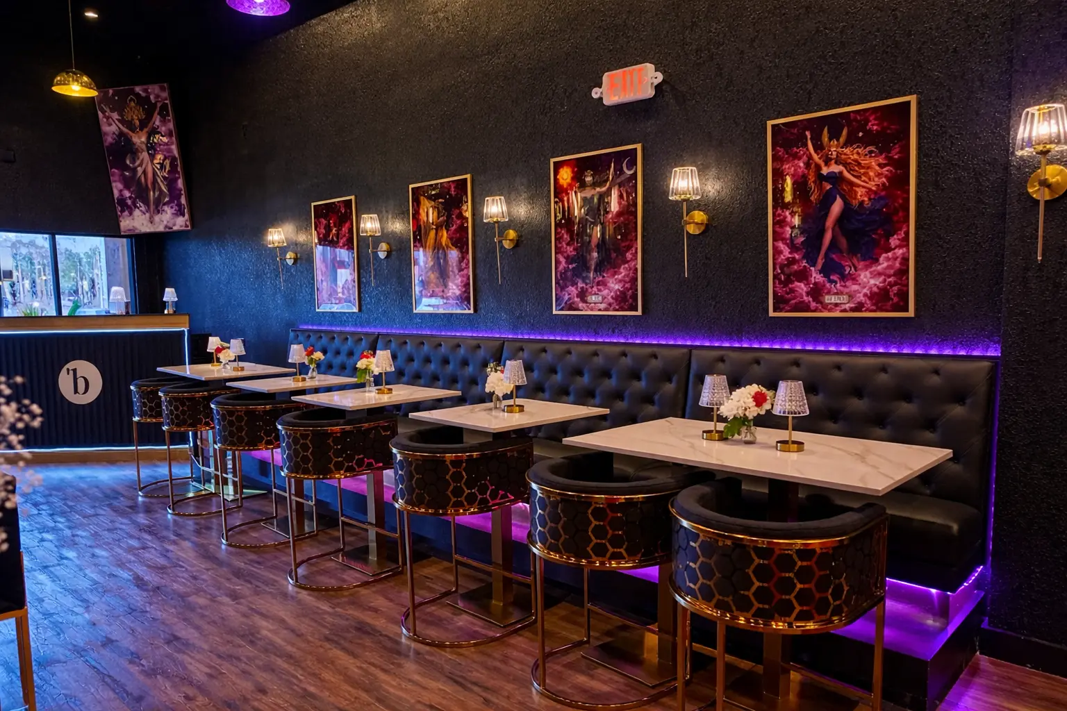 The empty Babe Coffee Lounge event space in Land O' Lakes, with booth seating, art-lined walls and purple lighting before guests arrive.