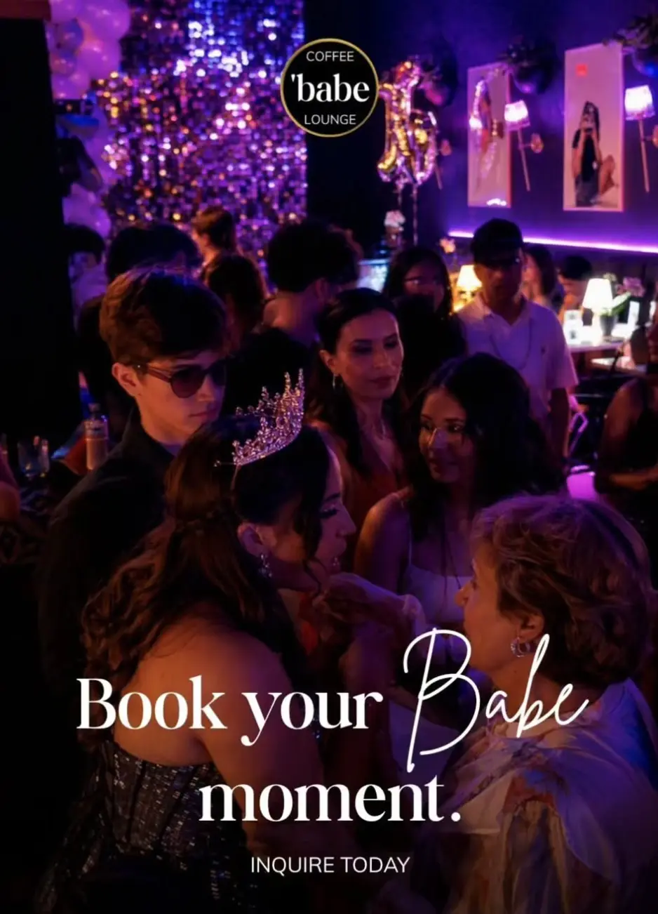 Guests fill Babe Coffee Lounge beneath purple lights during a private celebration with balloons and décor.