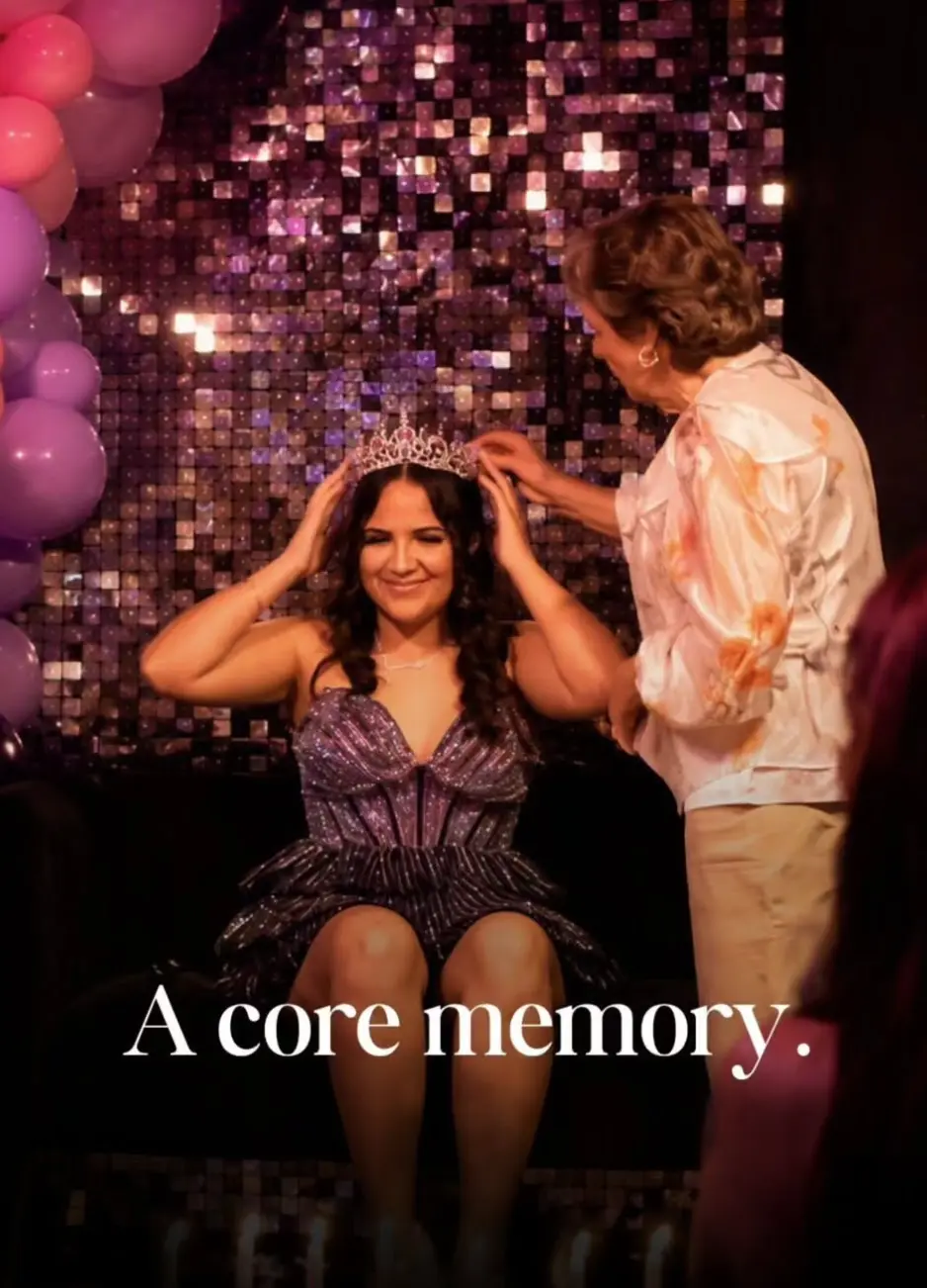 A young woman is crowned by her grandmother in front of a shimmering sequin wall and balloons during a private birthday party at Babe Coffee Lounge.